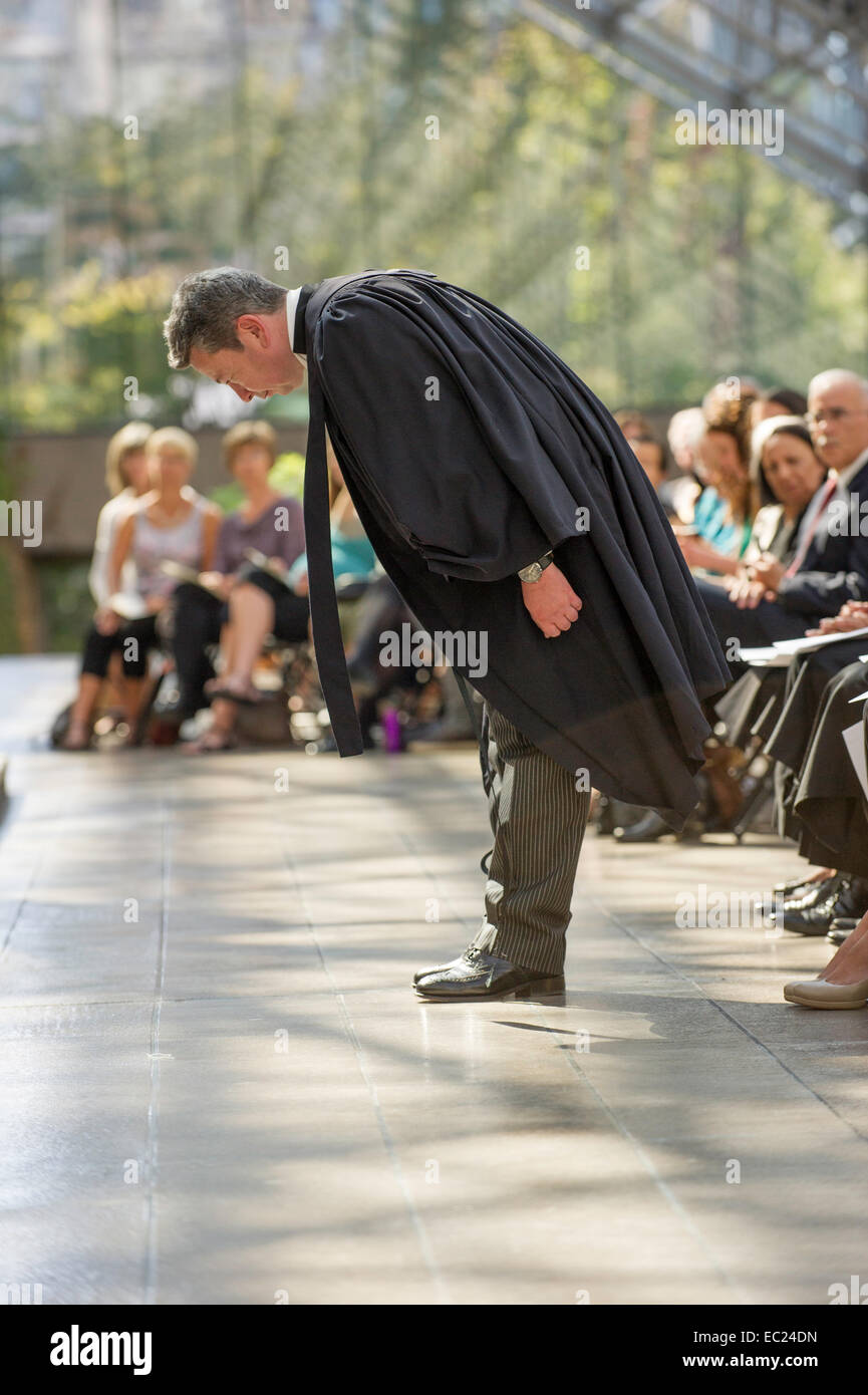 Future lawyer bowing showing respect to the court in a Call to Bar