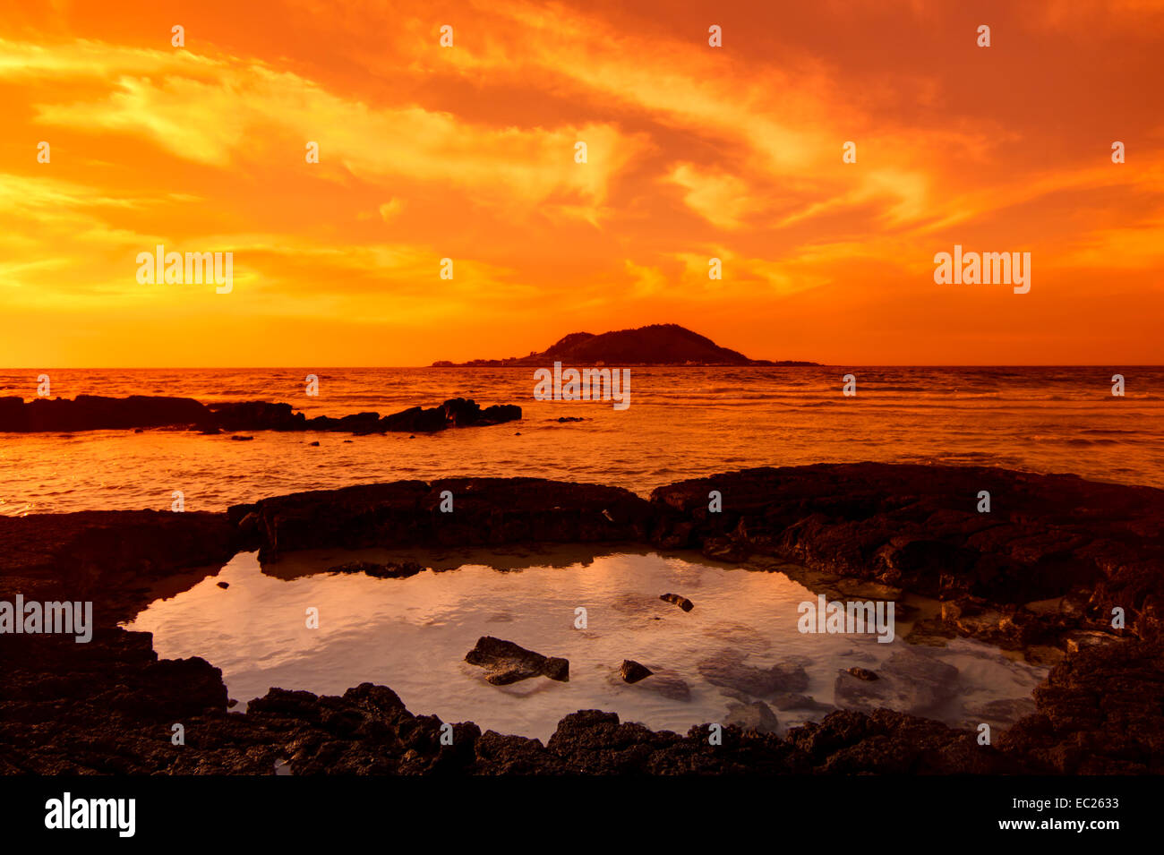 Sunset seascape and volcano, Cheju island, Korea. Stock Photo