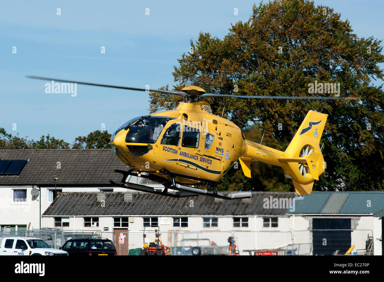 Air Ambulance leaving Raigmore hospital Inverness after bringing in a patient for treatment.  SCO 9294. Stock Photo