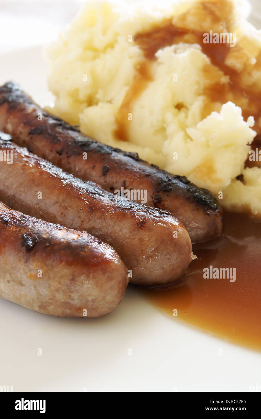 Bangers and Mash a hearty meal of sausages and mashed potato with gravy Stock Photo