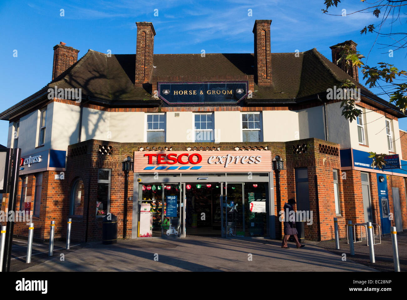 Tesco Express supermarket: pub / public house converted from Horse and Groom into convenience store / metro suoer market. UK. Stock Photo