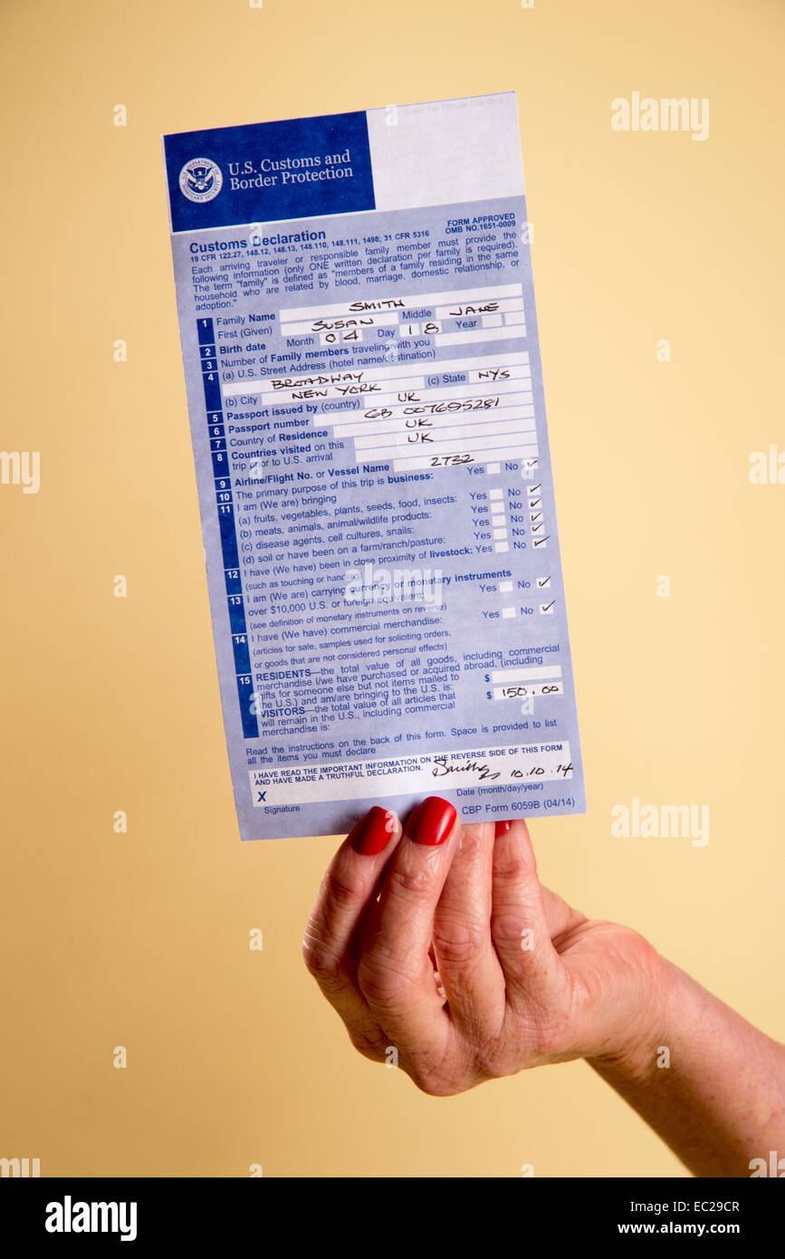 American Customs Declaration Form In A Womans Hand Usa 