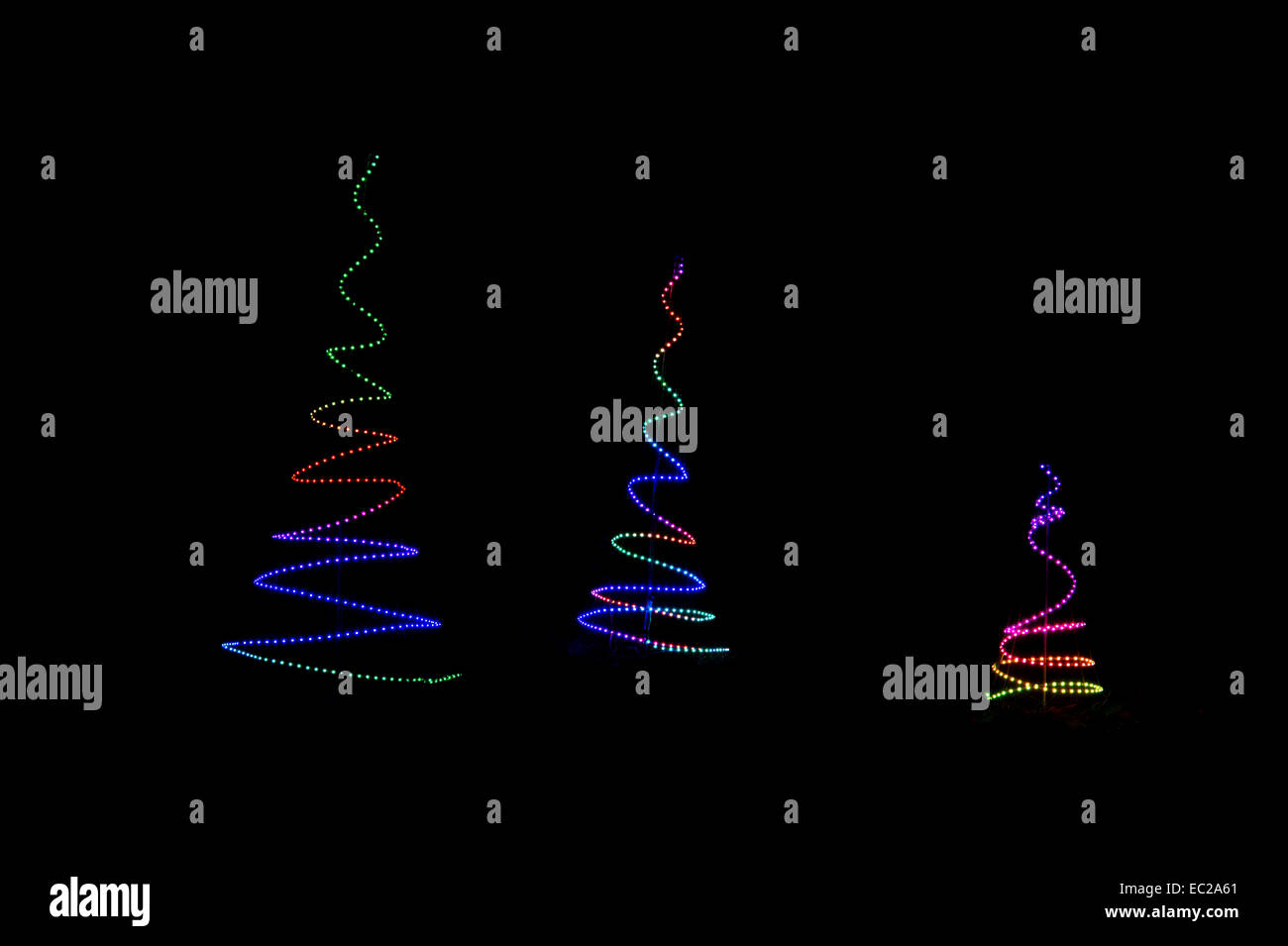 Colourful Contemporary Christmas tree LED lights on a black background Stock Photo