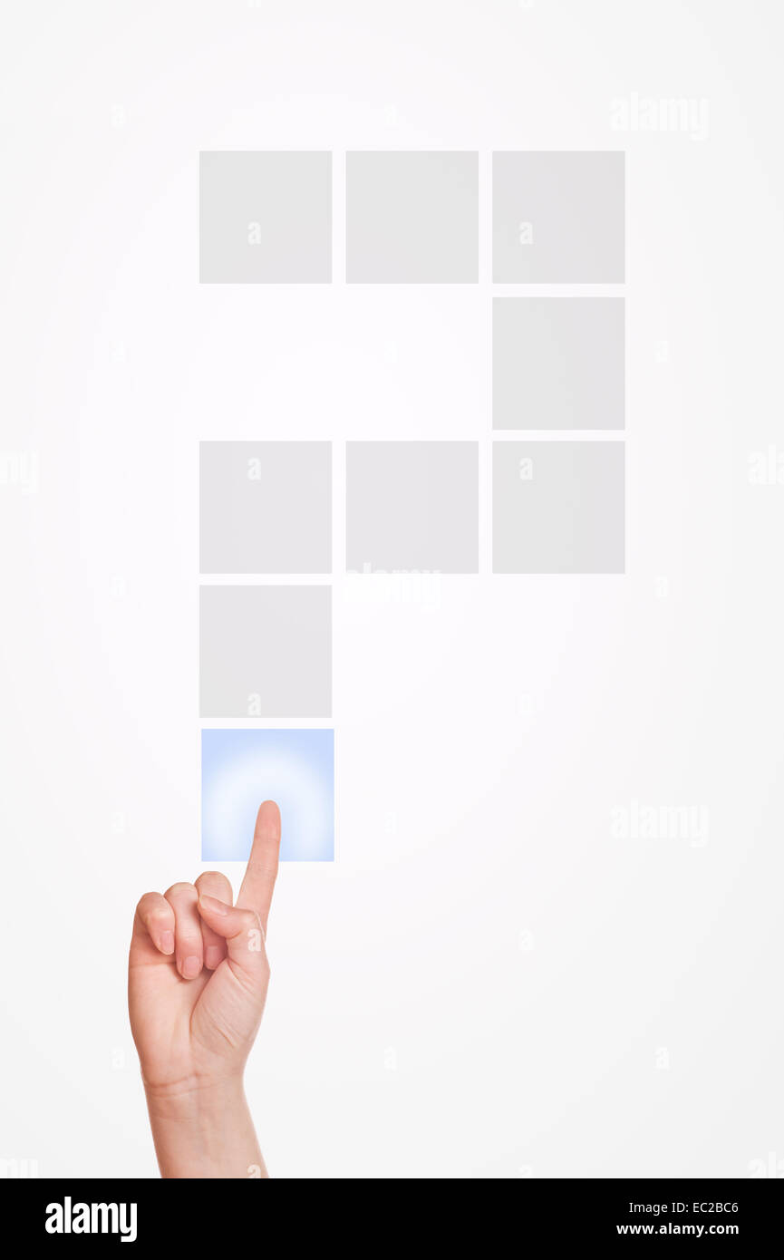 Caucasian female hand pressing touchscreen question mark with index finger. Stock Photo