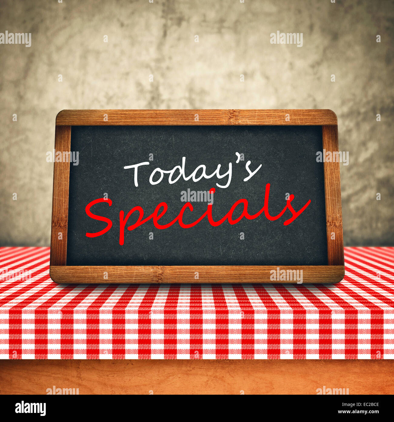 Today's Special Title in white chalk on Restaurant Blackboard. Food and Nutrition background. Stock Photo