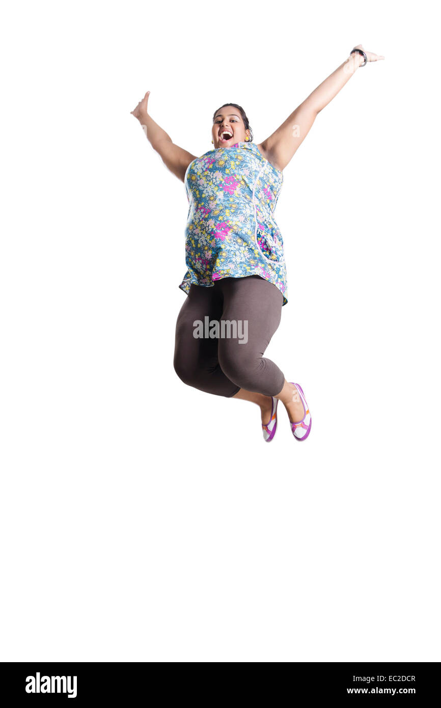 indian Obese Lady Jumping Stock Photo