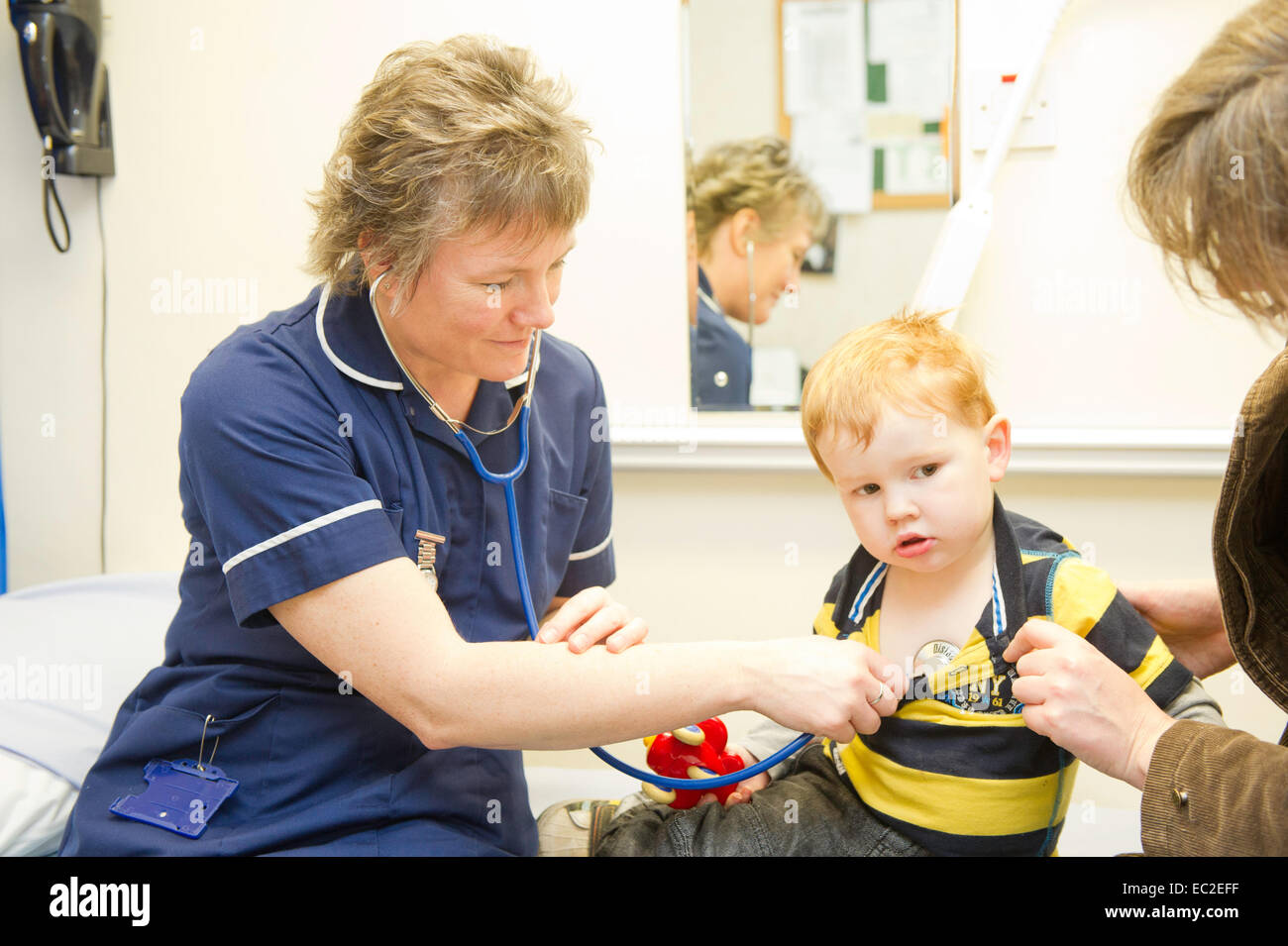 A little boy at the doctors surgery having a check up Stock Photo