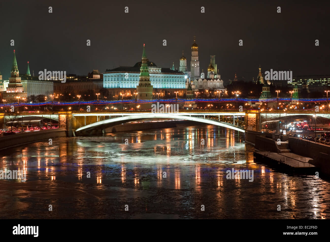 The Moscow Kremlin at night. View of the Moscow Kremlin and the Bolshoy Kamenny bridge at night. Stock Photo