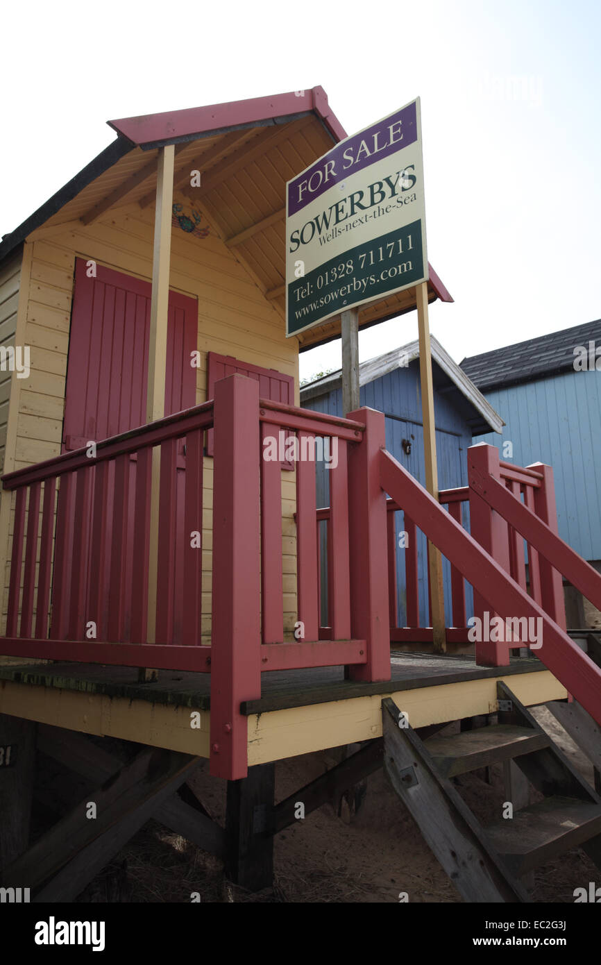 Beach Hut for sale; at WellsNextTheSea, Norfolk, England Stock Photo
