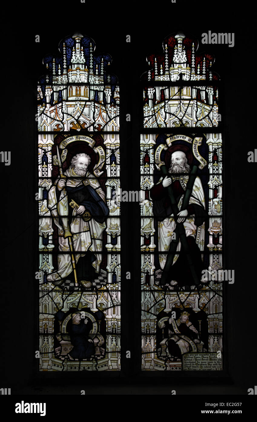 A stained glass window by Herbert William Bryans depicting Saints Peter and Andrew, Letheringsett Church, Norfolk Stock Photo