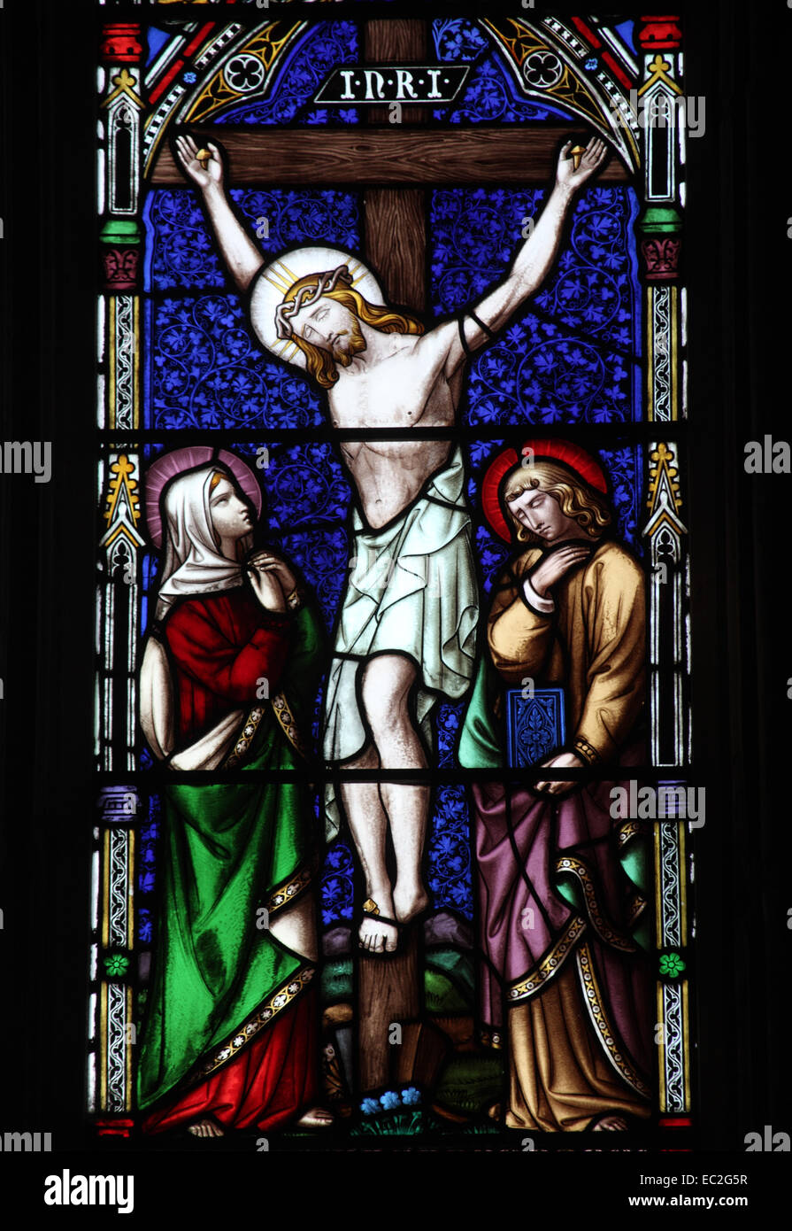 A stained glass window by William Wailes depicting The Crucifixion of Christ, St Bartholomew Church, Richard's Castle, Herefords Stock Photo
