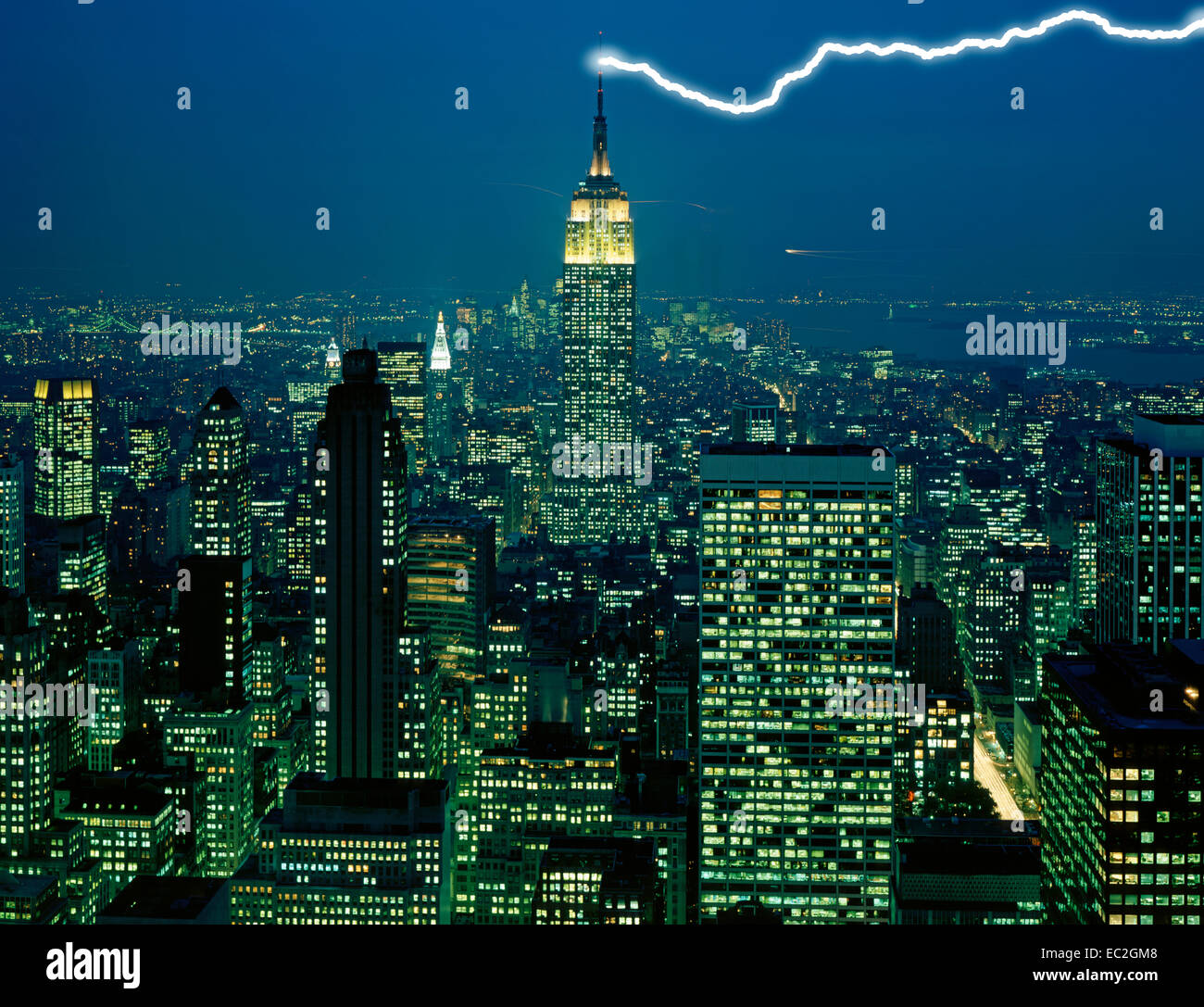 lightning bolt striking Empire State Building in New York City Stock Photo