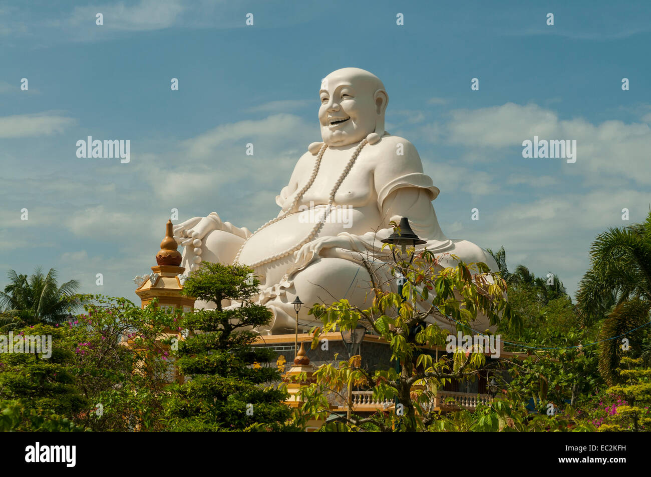 Happy Buddha at Vinh Trang Pagoda, My Tho, Vietnam Stock Photo