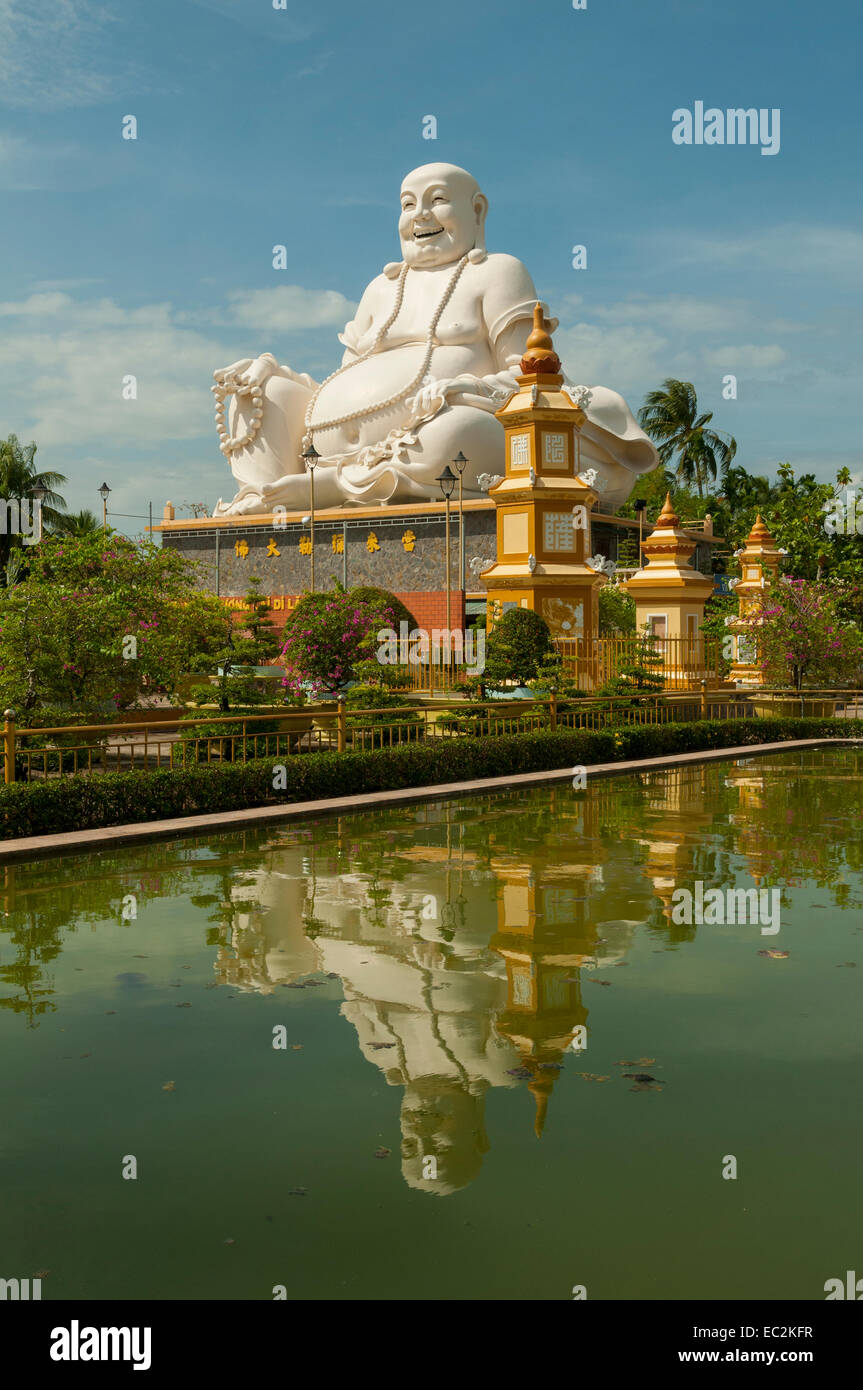 Happy Buddha at Vinh Trang Pagoda, My Tho, Vietnam Stock Photo