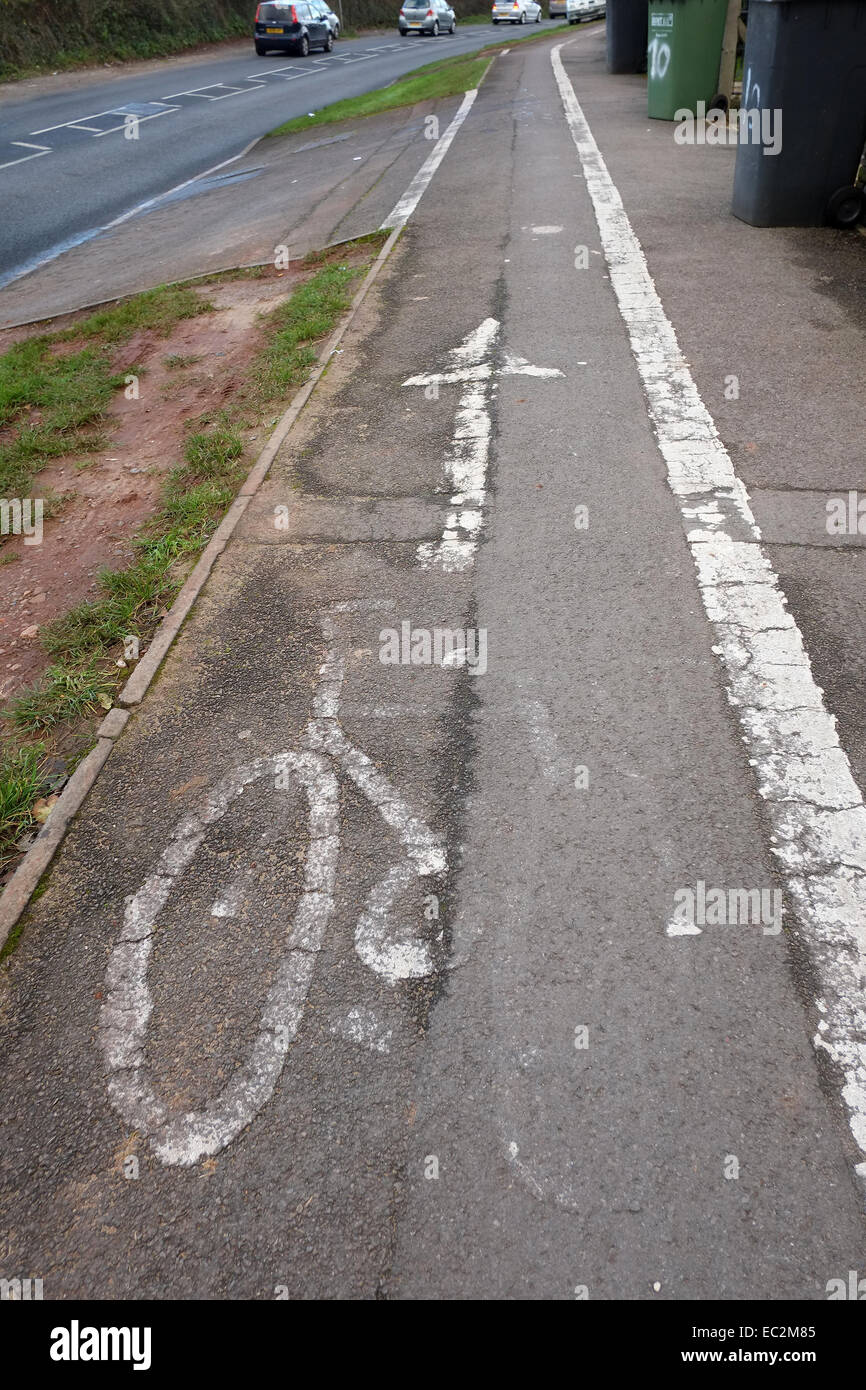 Worn cycle path markings showing a lack of maintenance, in Winetrbourne, South Gloucestershire, 8th December 2014 Stock Photo