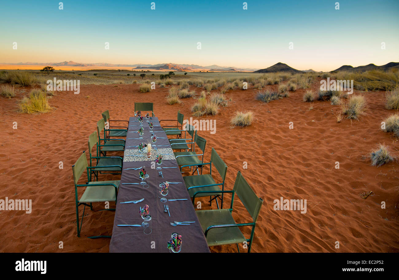 Africa, Namibia. Tok Tokkie Trails. Dinner table at the campsite. Stock Photo