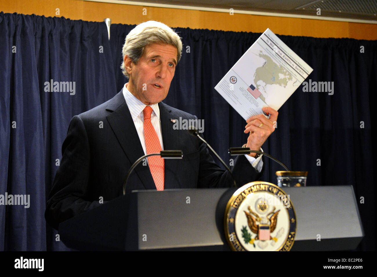 US Secretary of State John Kerry announces the release of the Department of State’s “To Walk the Earth in Safety,” a report summarizing the accomplishments of the Conventional Weapons Destruction Program December 8, 2014 in Washington, D.C. Stock Photo