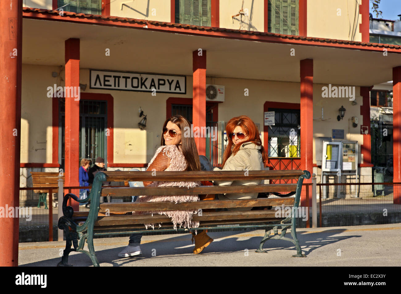 Smiling ladies at the train station of Leptokarya, Municipality of Olympus - Dion, Pieria, Macedonia, Greece Stock Photo