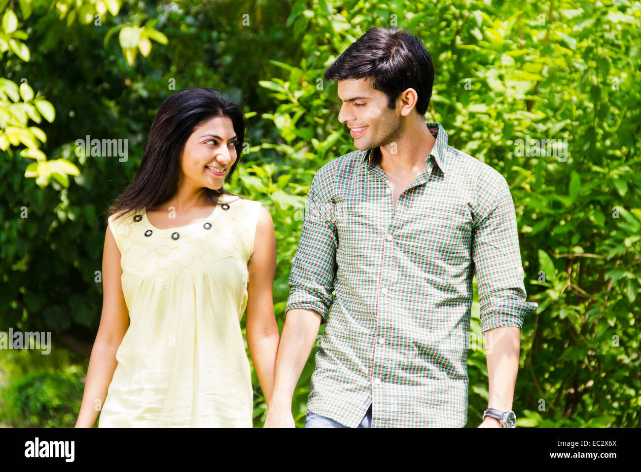 2 indian couple park enjoy Stock Photo - Alamy