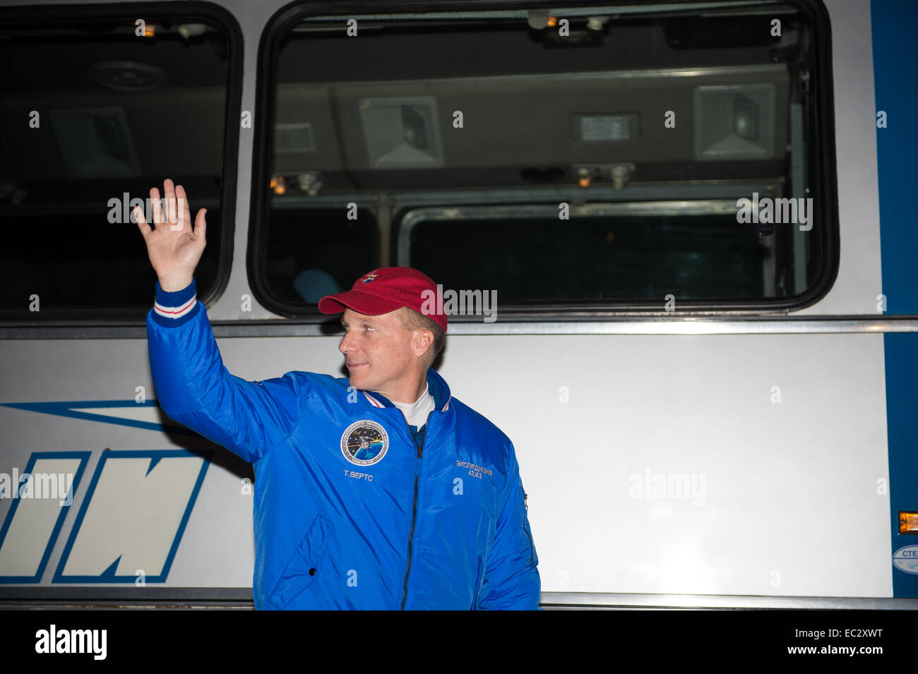 Expedition 42 Flight Engineer Terry Virts of NASA, waves farewell to family and friends as he departs the Cosmonaut Hotel to suit up for the Soyuz launch to the International Space Station on Sunday, Nov. 23, 2014, in Baikonur, Kazakhstan. Launch of the Soyuz rocket is scheduled for the early hours of Nov. 24 and will send Virts, Soyuz Commander Anton Shkaplerov of the Russian Federal Space Agency (Roscosmos), and Flight Engineer Samantha Cristoforetti of the European Space Agency (ESA) on a five and a half month mission aboard the International Space Station. Stock Photo