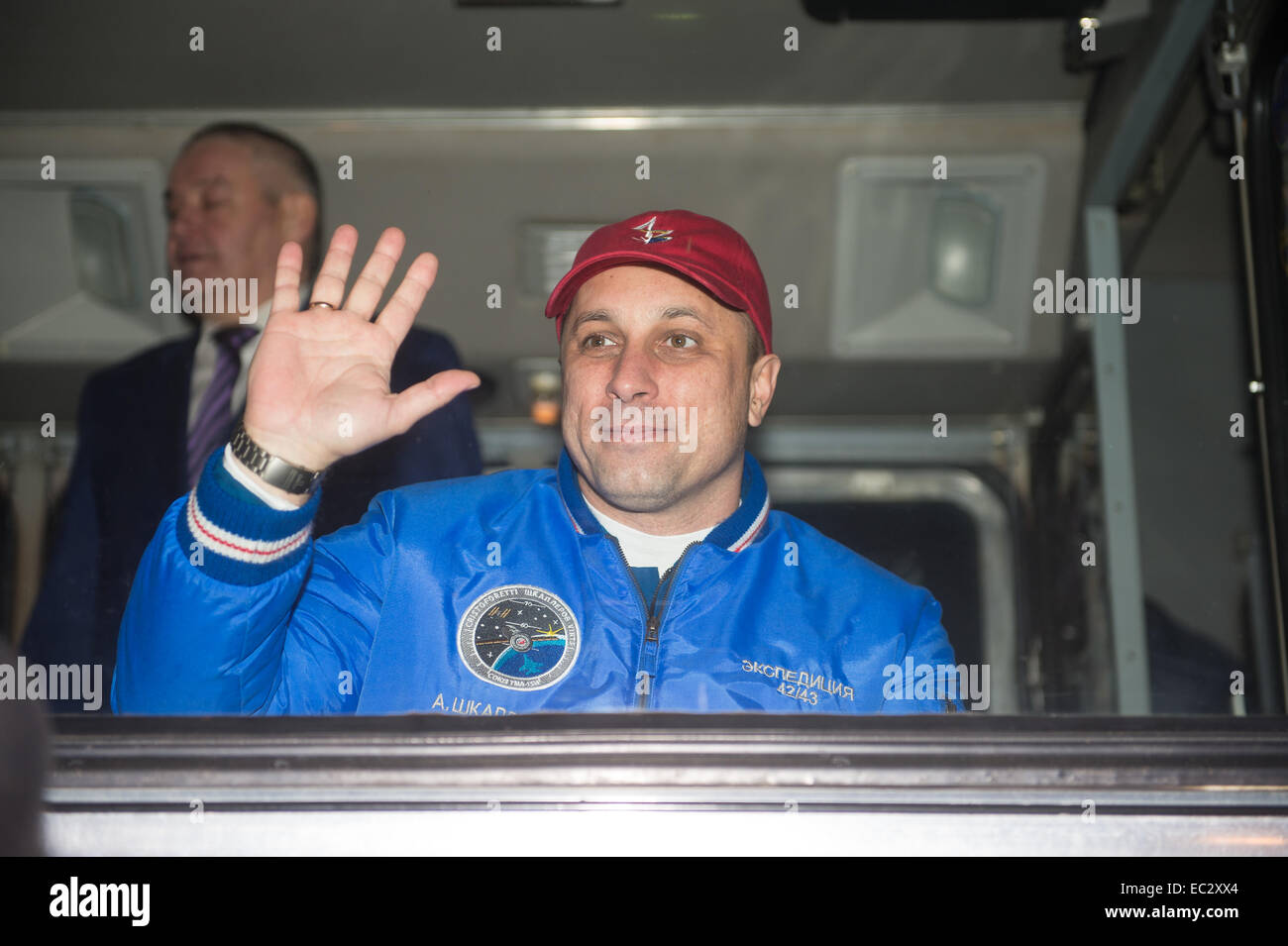 Expedition 42 Soyuz Commander Anton Shkaplerov of the Russian Federal Space Agency (Roscosmos) waves farewell to family and friends as he departs the Cosmonaut Hotel to suit up for the Soyuz launch to the International Space Station on Sunday, Nov. 23, 2014, in Baikonur, Kazakhstan. Launch of the Soyuz rocket is scheduled for the early hours of Nov. 24 and will send Shkaplerov, Flight Engineer Samantha Cristoforetti of the European Space Agency (ESA), and Flight Engineer Terry Virts of NASA on a five and a half month mission aboard the International Space Station. Stock Photo