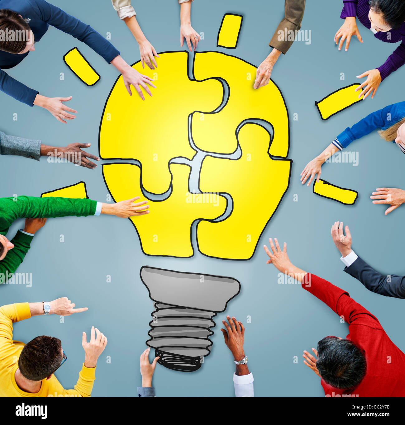 People with Jigsaw Puzzle Forming Light Bulb in Photo and Illustration Stock Photo Alamy