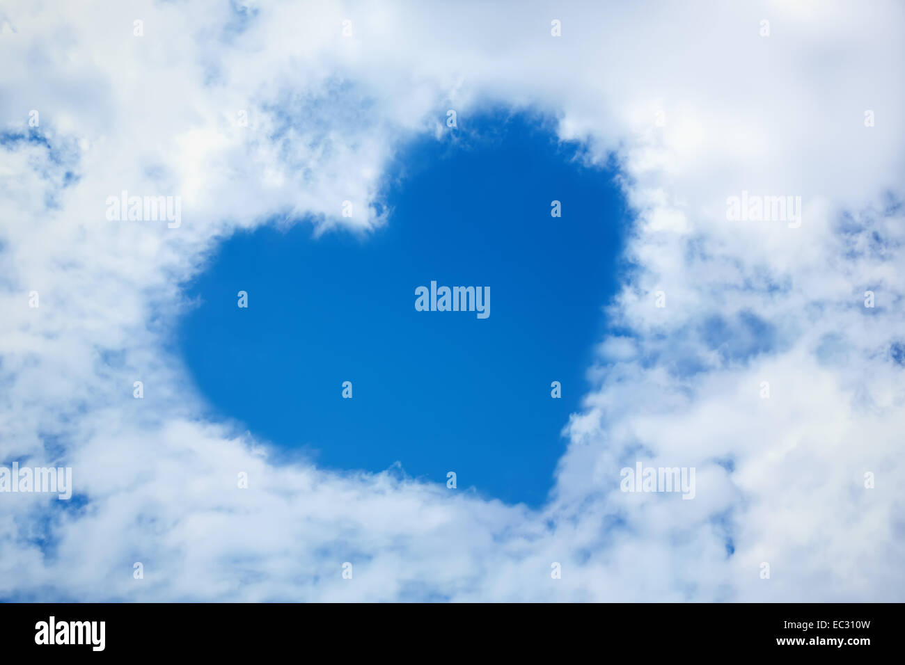 Heart from cloud in the blue sky Stock Photo - Alamy