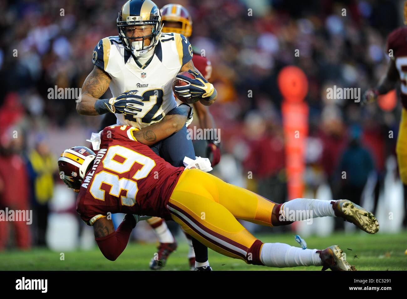 DEC 07, 2014 : Washington Redskins cornerback David Amerson (39) tries to tackle St. Louis Rams wide receiver Stedman Bailey (12) during the matchup between the St. Louis Rams and the Washington Redskins at FedEx Field in Landover, MD. Stock Photo