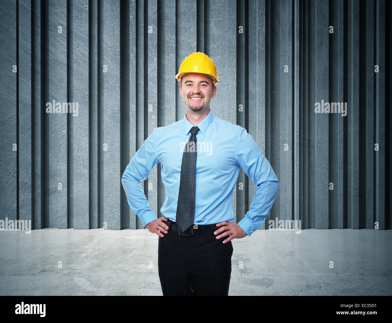 smiling worker and concrete background Stock Photo