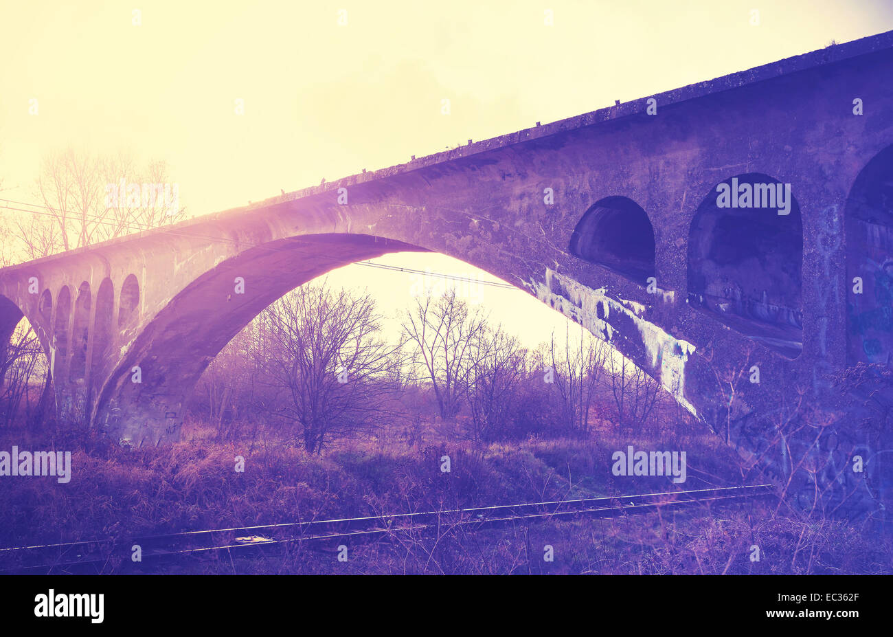 Retro vintage filtered picture of an arch bridge. Stock Photo