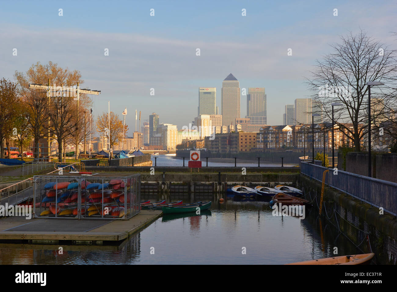 Canoes and kayaks in a lock next to the river Thames opposite Canary Wharf east London England Europe Stock Photo