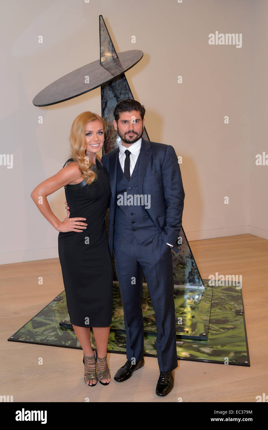 Artist and photographer Andrew Levitas and his wife, classical singer, Katherine Jenkins at Phillip's Gallery, London. Stock Photo