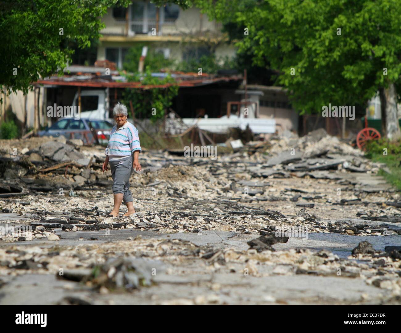 Torrential rain throughout Bulgaria has caused severe flooding, destroying thousands of homes and cars. Doliste is one of the worst hit villages, where a small river overflowed during the night sending a three-foot wave crashing through the streets. About Stock Photo