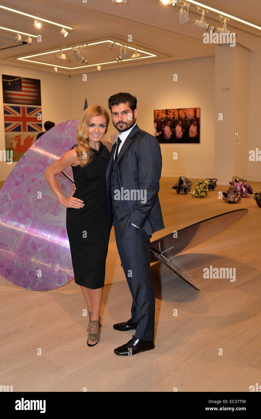 Artist and photographer Andrew Levitas and his wife, classical singer, Katherine Jenkins at Phillip's Gallery, London. Stock Photo
