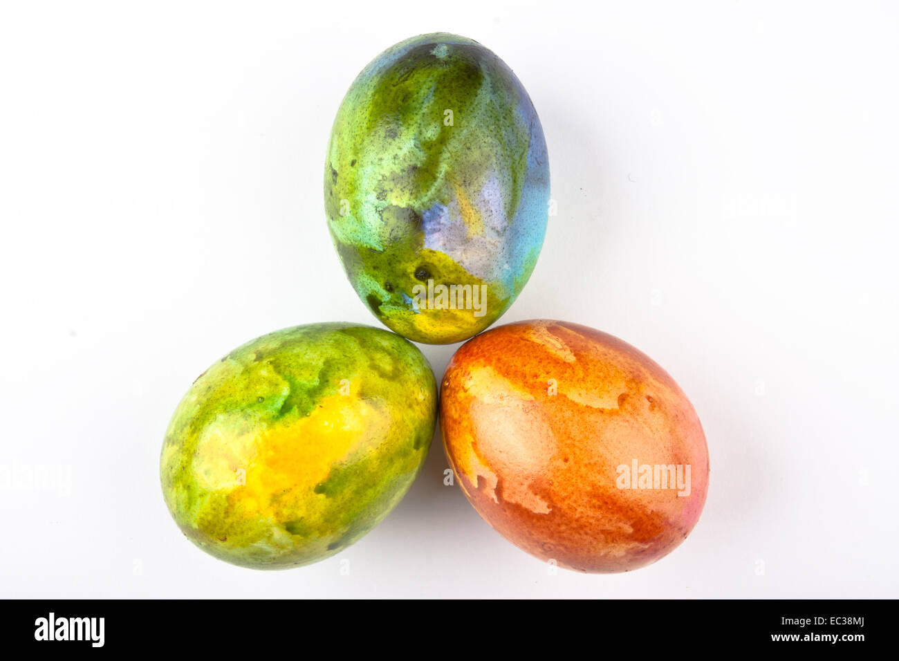 Three Easter eggs in pastel colors. Stock Photo