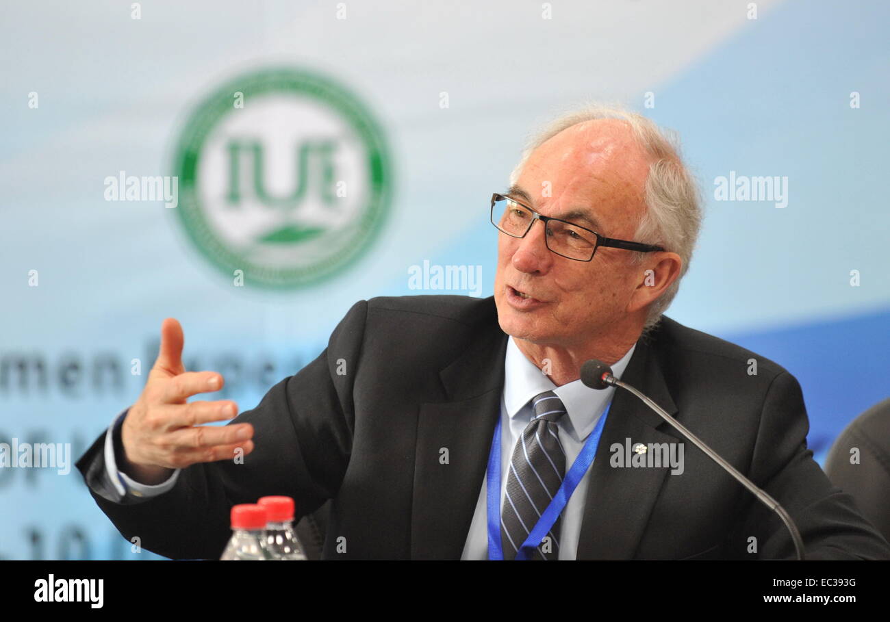 Xiamen, China's Fujian Province. 9th Dec, 2014. Gorden McBean, chairman of the International Council for Science, speaks at the Urban Health and Wellbeing - International Programme Meeting in Xiamen, southeast China's Fujian Province, Dec. 9, 2014. About 60 experts attended the meeting of Urban Health and Wellbeing International Programme held by International Council for Science (ICSU), InterAcademy Medical Panel and United Nations University at the Institute of Urban Environment of Chinese Academy of Science on Tuesday. © Lin Shanchuan/Xinhua/Alamy Live News Stock Photo