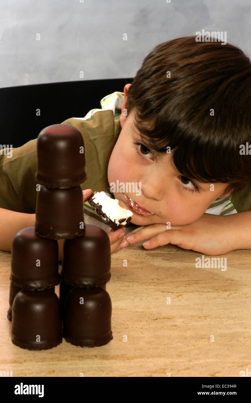 Sweets Sad A young boy looks sad to the sweets Stock Photo - Alamy