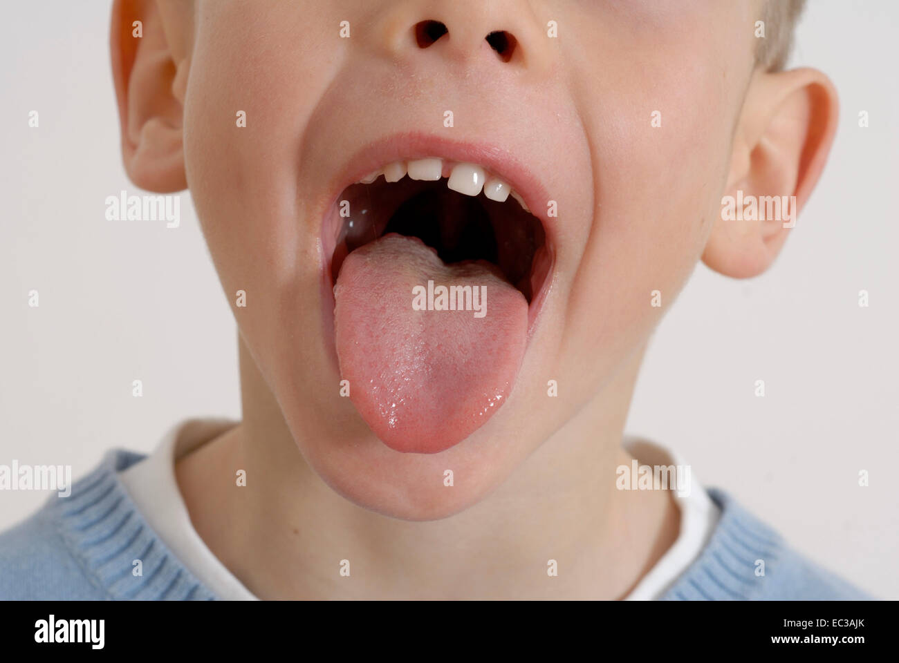 Little Boy Sticking Out Tongue Stock Photo Alamy