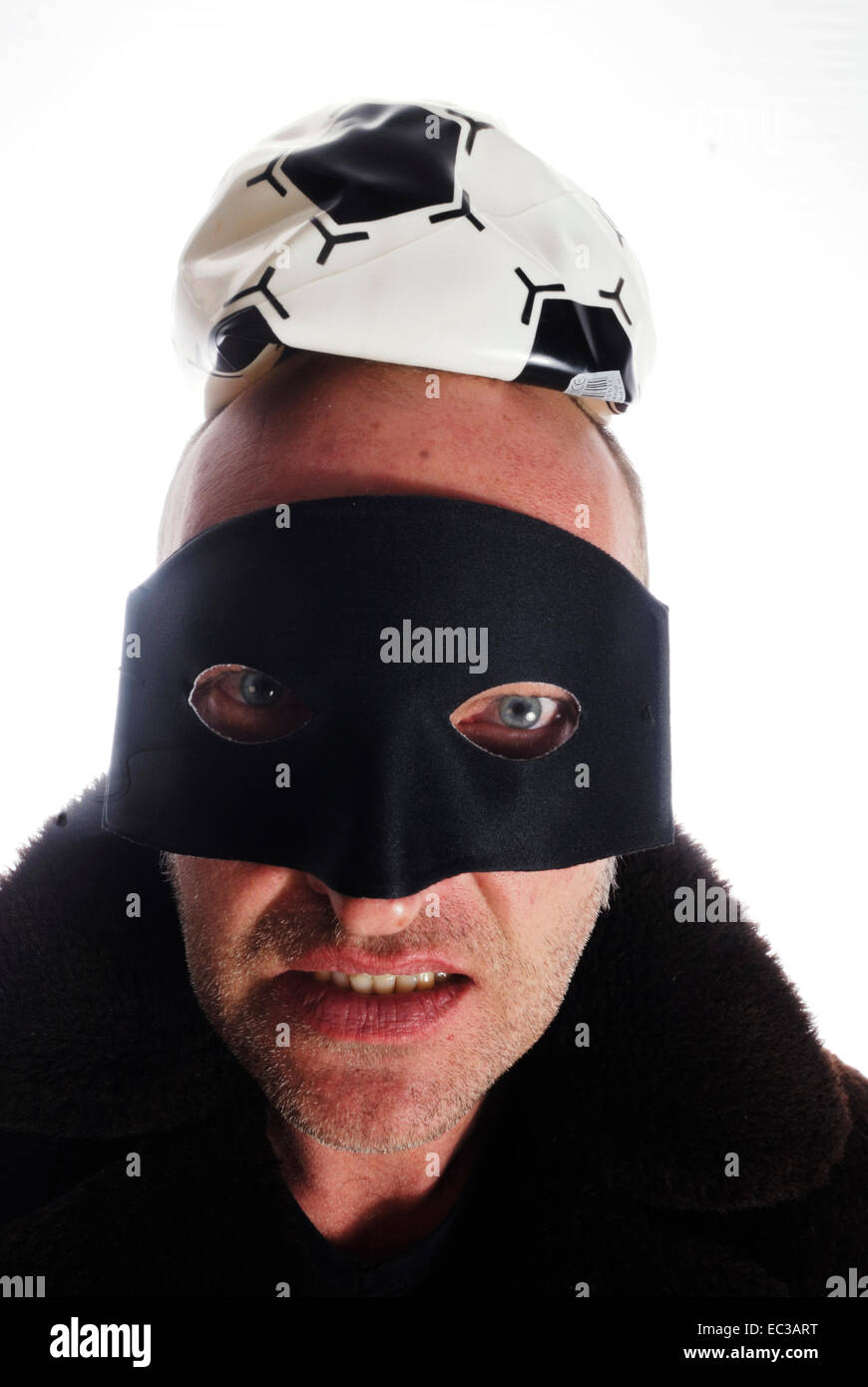 Man with Mask and Soccerball Stock Photo