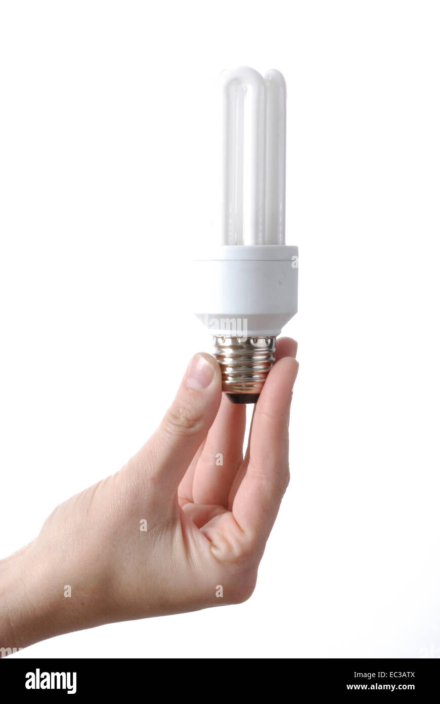 Hand holding Energy Saving Lamp Stock Photo