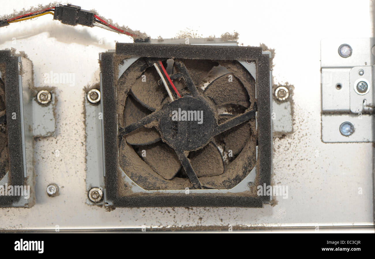 Dust accumulation inside electronic equipment showing a cooling fan