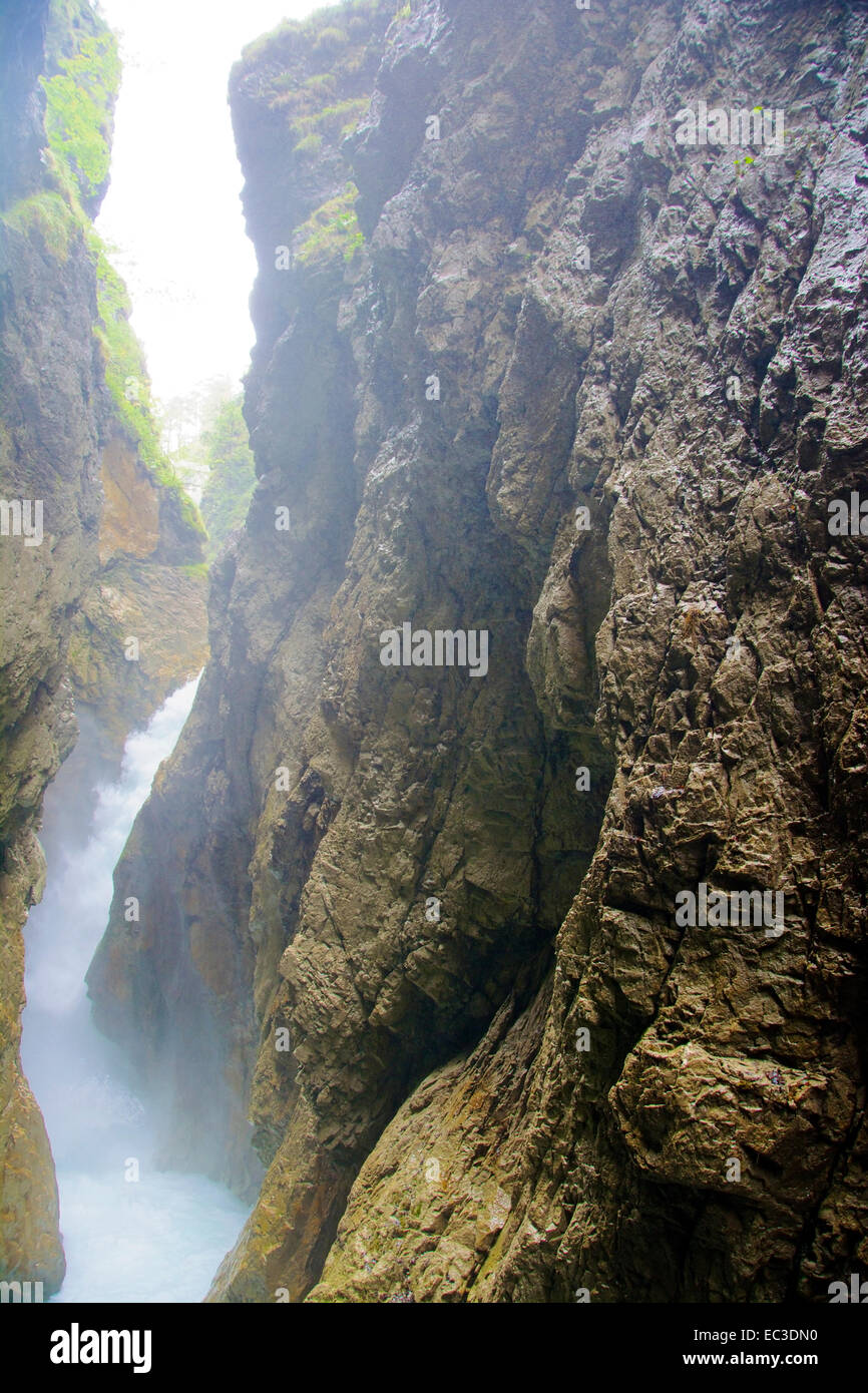 View into a deep canyon with wild water running Stock Photo