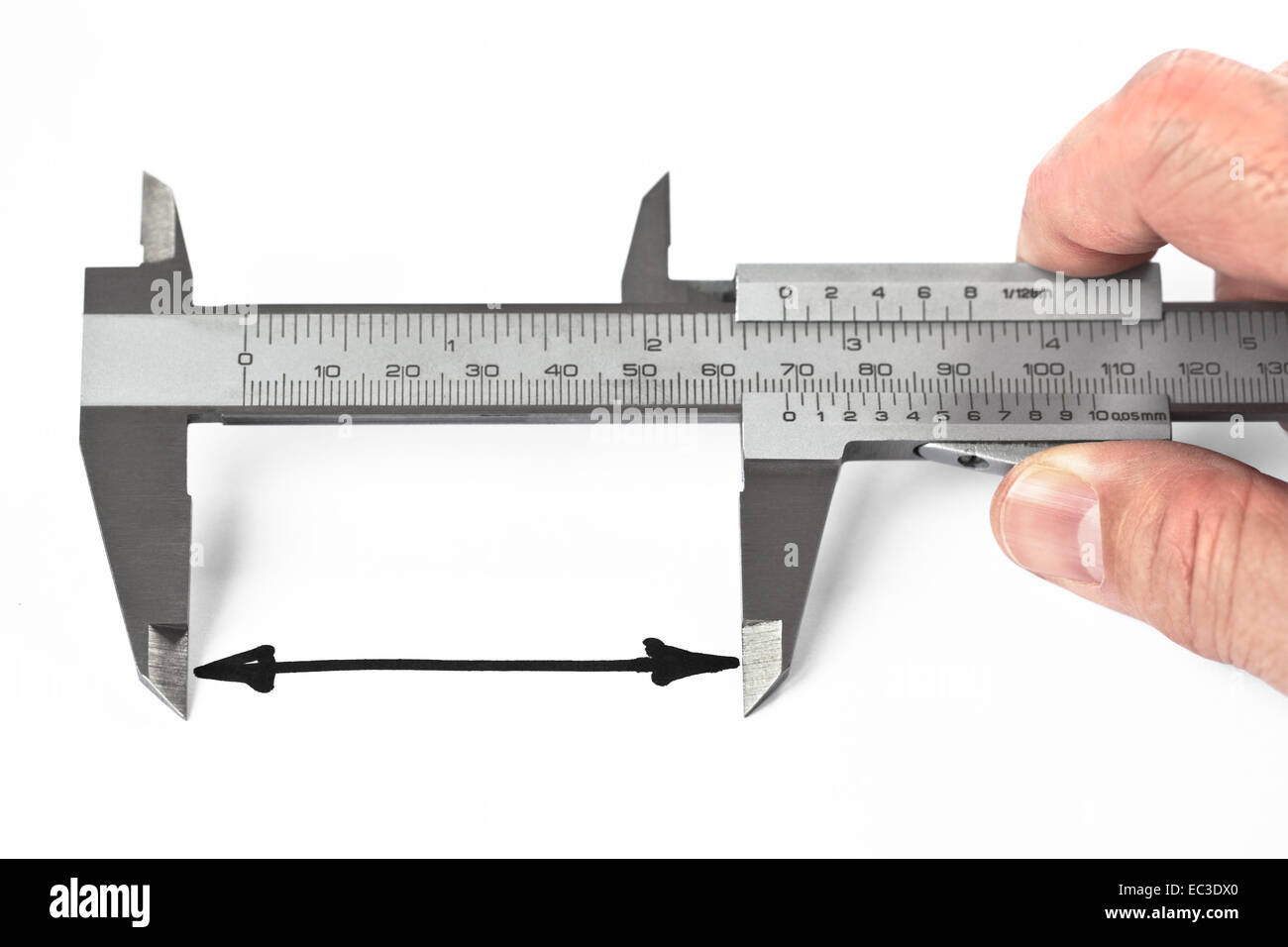 Man measuring distance with caliper Stock Photo