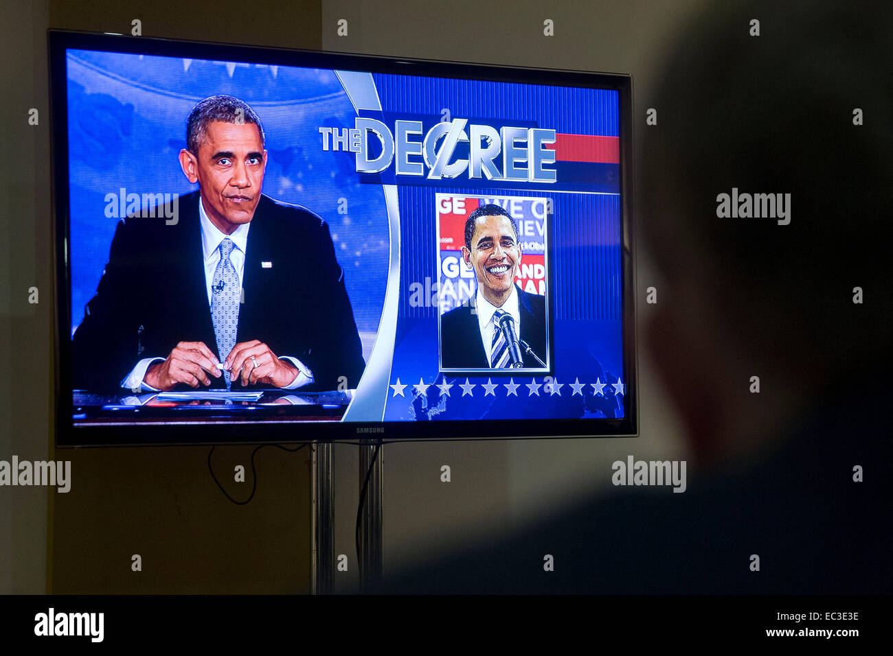 Washington, DC, USA. 8th Dec, 2014. United States President Barack Obama is seen on a television screen as he guest hosts during a taping of Comedy Central's 'The Colbert Report' in Lisner Auditorium on the campus of George Washington University in Washington, DC, U.S., on Monday, December 8, 2014. This is President Obama's third appearance on 'The Colbert Report' that will broadcast its final show on December 18, 2014. Credit:  dpa picture alliance/Alamy Live News Stock Photo