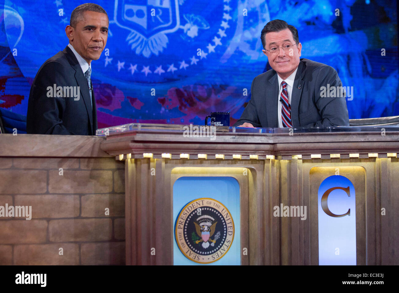 Washington, DC, USA. 8th Dec, 2014. United States President Barack Obama, left, tapes Comedy Central's 'The Colbert Report' with television personality Stephen Colbert in Lisner Auditorium on the campus of George Washington University in Washington, DC, U.S., on Monday, December 8, 2014. This is President Obama's third appearance on 'The Colbert Report' that will broadcast its final show on December 18, 2014. Credit:  dpa picture alliance/Alamy Live News Stock Photo