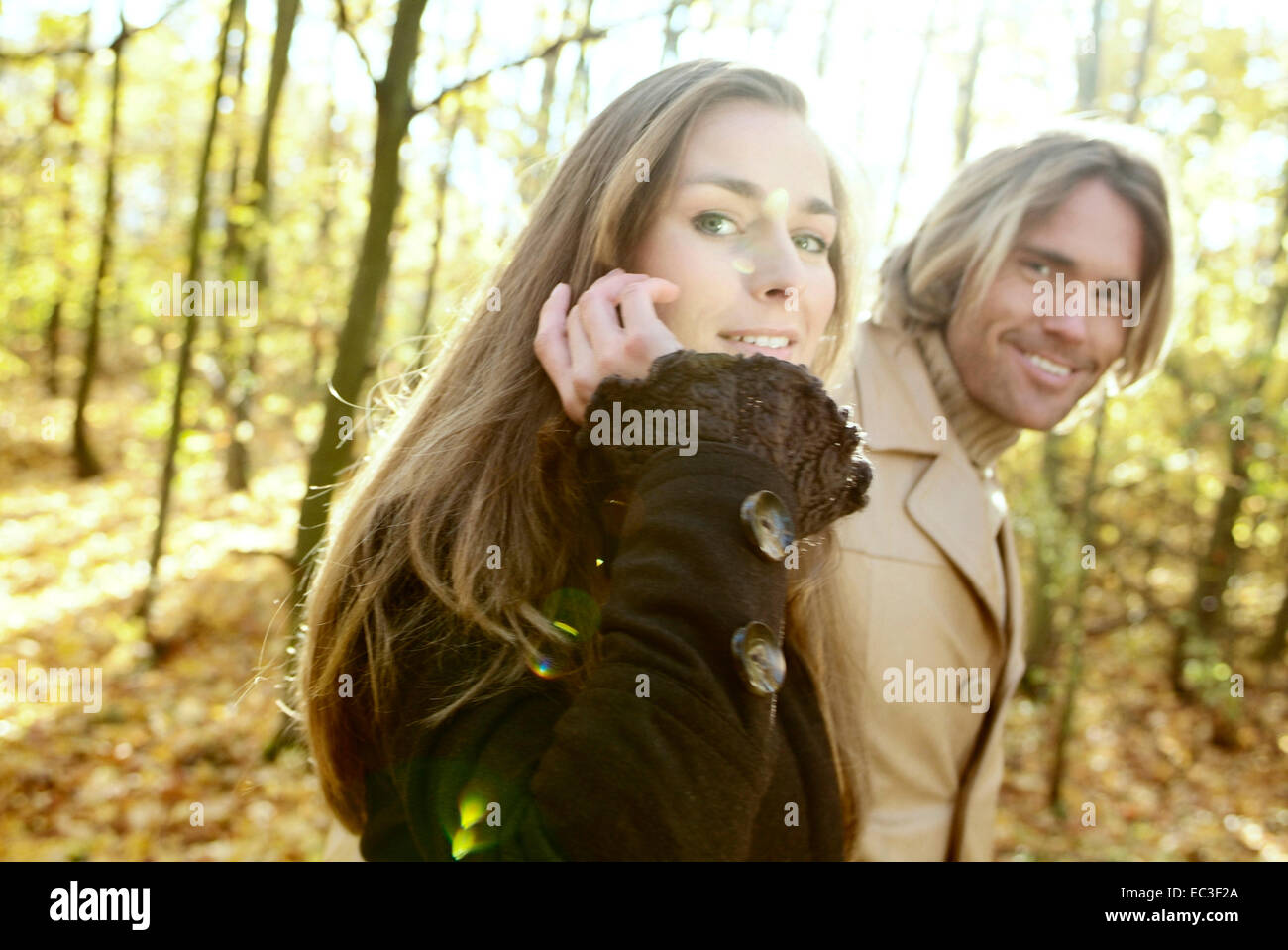 Young couple on an autumn walk Stock Photo - Alamy