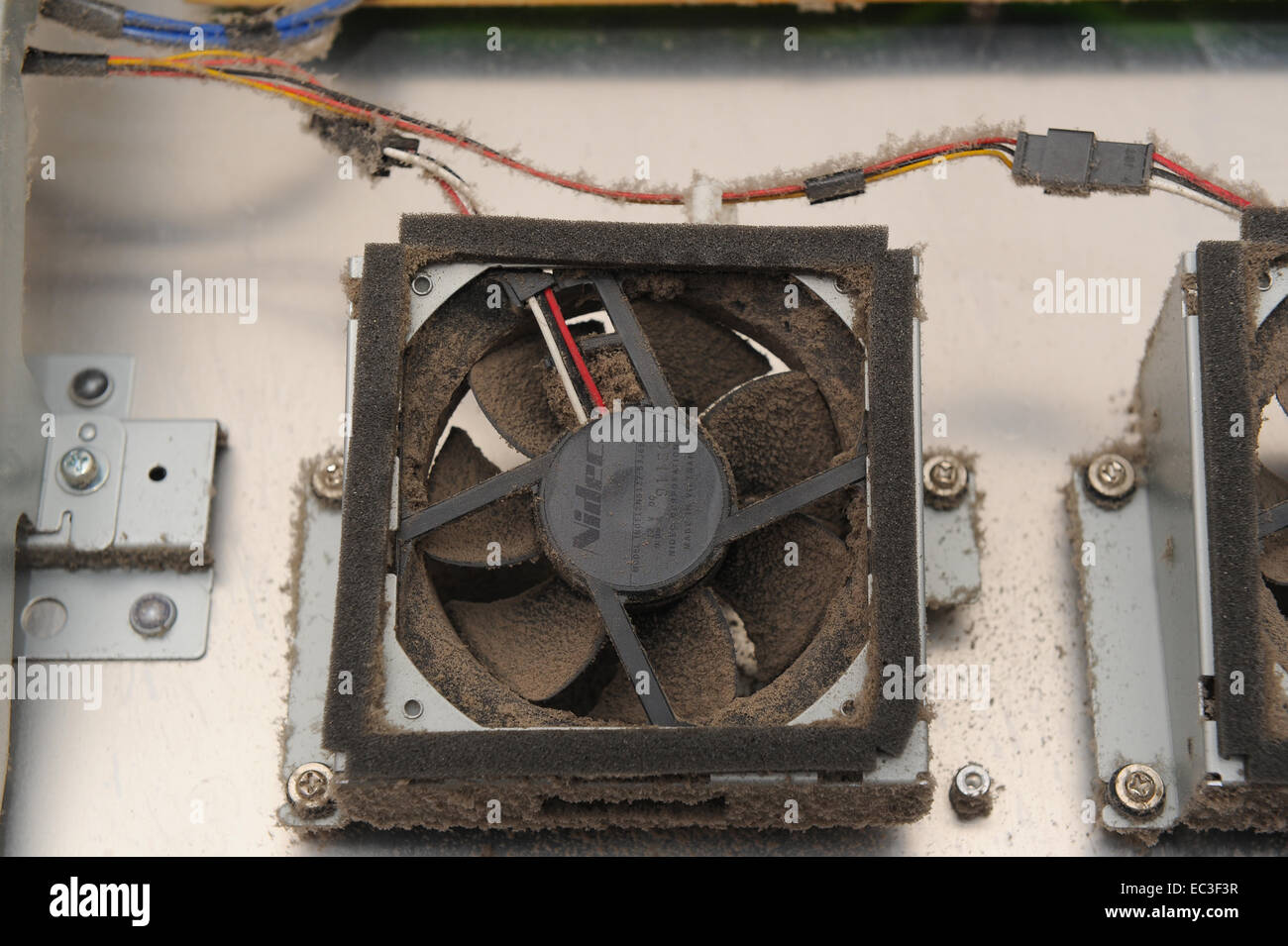 Dust accumulation inside electronic equipment showing cooling fan
