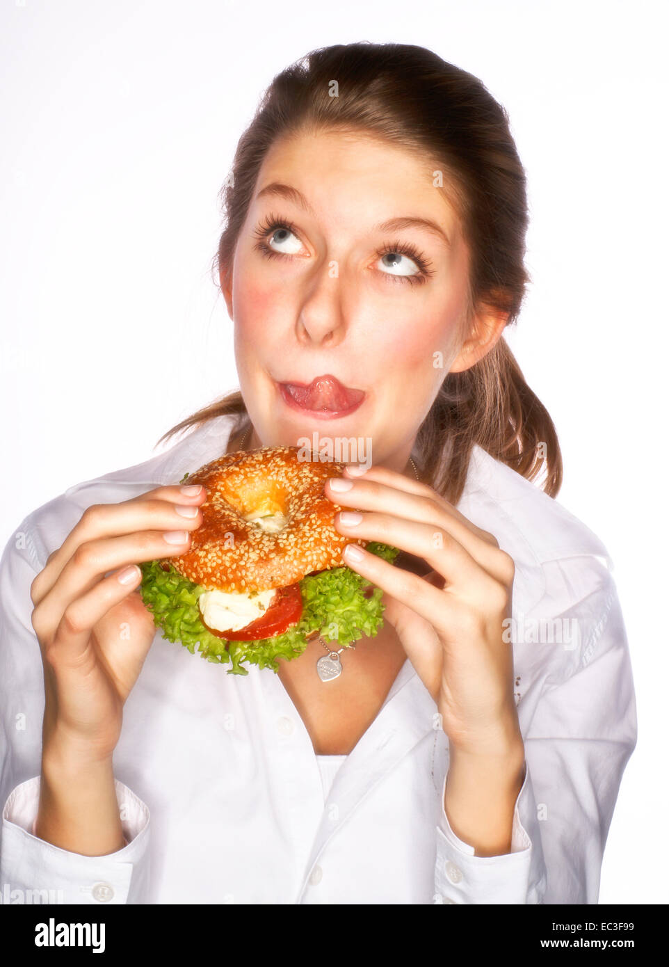 Woman Eating Bagel Stock Photo 76295221 Alamy