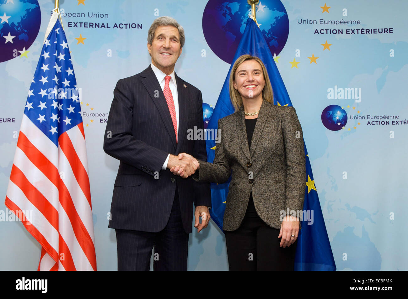 U.S. Secretary of State John Kerry and European Union High Representative for Foreign Affairs Federica Mogherini pose for photographers at the outset of a wide-ranging meeting on December 3, 2014, at the headquarters of the E.U. External Action Service in Brussels, Belgium. Stock Photo