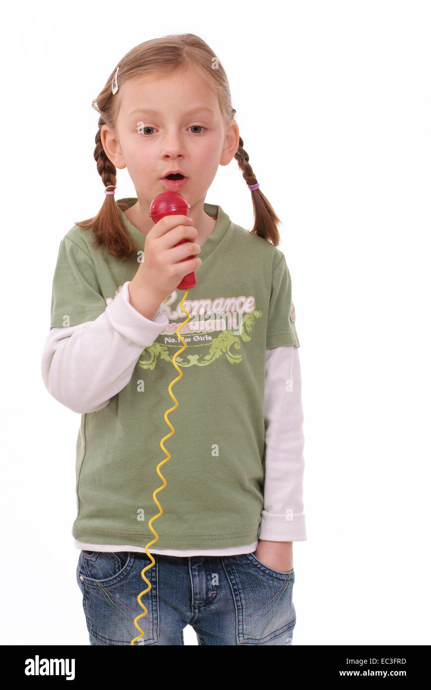 Young Girl singing Karaoke Stock Photo Alamy